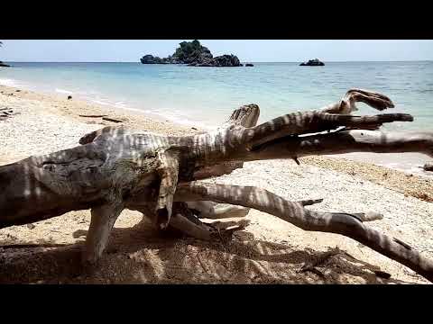 Amazing view of Brgy. Agbudia, Agdapdap Islet and cave along Rowena's Beach Resort