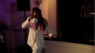 The host of the event led the show off in dramatic fashion with "Eye of the Tiger." Was it appropriately epic?
Pros:
• Miami Vice suit.
• Fantastic wig that puts all other wigs (*ahem* LeBron *ahem*) to shame.
• The kind of commitment that only a veteran like Battier can bring.
• Does push-ups while performing.
• He's a terrible singer, but goes so over the top that it becomes this weird, amazing performance art.
Cons:
• He is a terrible singer, but who cares. There's a reason the show was called "Battioke."