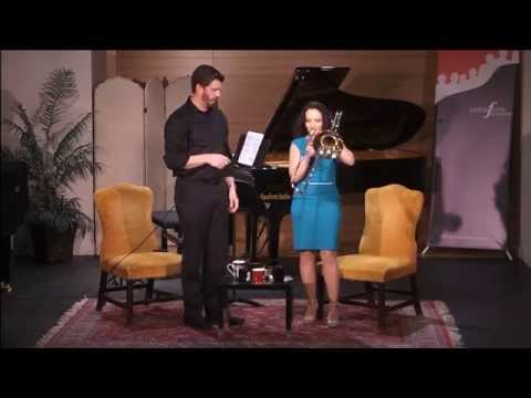Lyric Opera's trombonist Jeremy Moeller lets Yana try his trombone