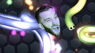 BECOMING A HUGE SNAKE! - SLITHER.IO w/ Vikkstar, and Woofless!