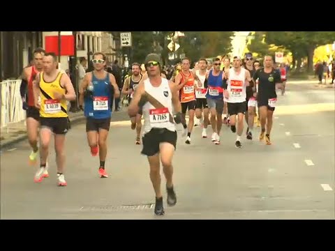 Family, friends cheer on Chicago marathon runners