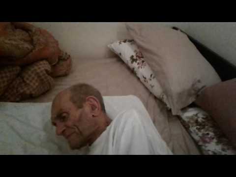 Dad tries to lift leg into bed 10 23 16 and thumb wrestle