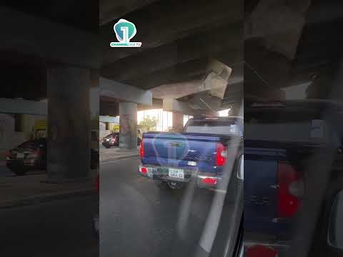 Overloaded Truck Gets Stuck Under Achimota Overpass, Causing Heavy Traffic