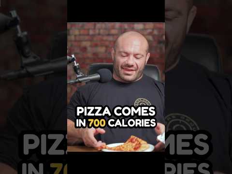 The Costco pizza slice. Do you believe the macros? #massenomics #shorts #pizza #macros #iifym #gym