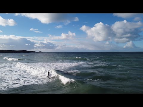 Aerial shots of scenic views and surfing at Little Fistral