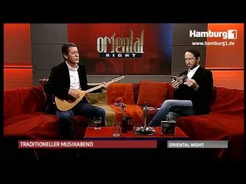 1. Aşır Özek über Telli Kur´an, Saz, Baglama, Cura und Divan + live performance