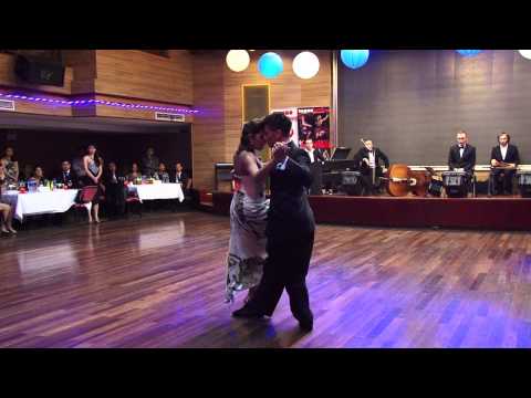  Sebastian Achaval  and  Roxana Suarez  are  dancing  to  a  tango  at  Shanghai Tango Marathon  in  2013