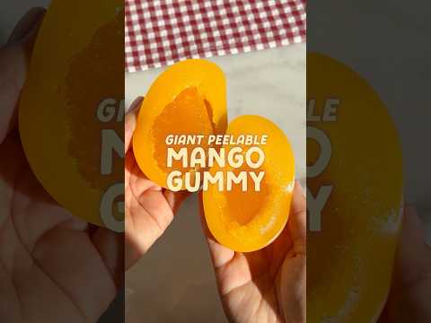 Trying a GIANT Peelable Mango Gummy 🥭 @amossweets #mango #peelablegummy #gummy