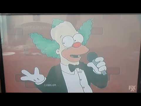 Krusty The Clown tells bad jokes on stage.