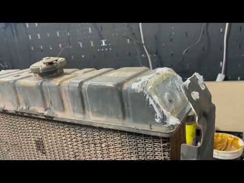 How to solder and repair a radiator bracket! Fixing the John Deere 6675 Skid steer radiator!