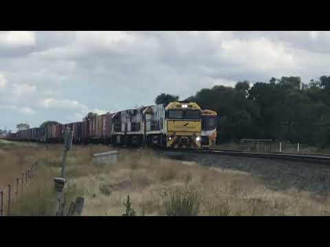 NR27, 9323, NR38 slowly pass Wallan crossing and head into the sidings for a South Bound N class