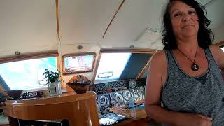 Rebel sailing on iDos Kids are fishing for Ocean trash.