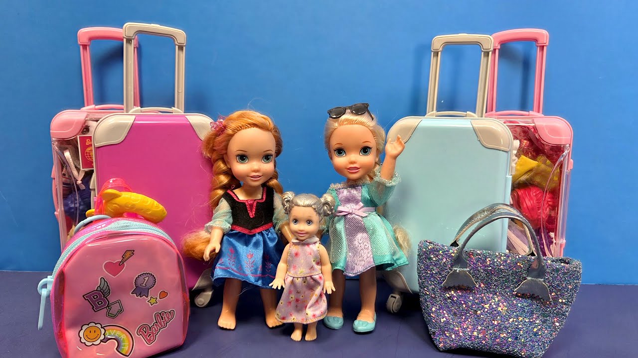 Packing the bags ! Elsa & Anna toddlers - getting ready for a trip - baggage - Barbie dolls
