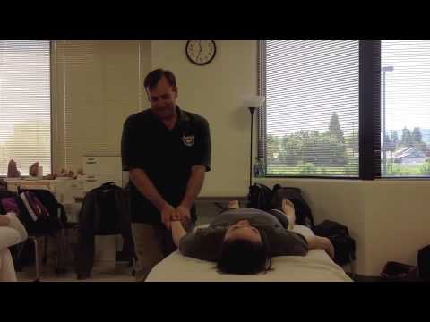 Gary Schwander demonstrates pre-event sports massage