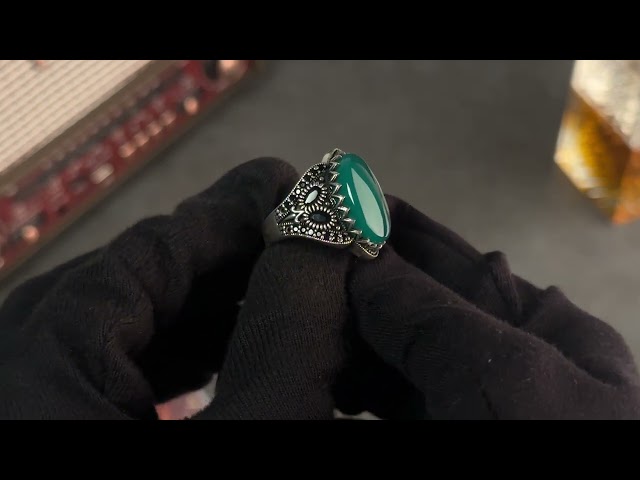 Men's silver ring decorated with green agate stone