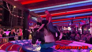 Download lagu FUN GIRL AND GUY RIDING ON A BULL IN BENIDORM mp3