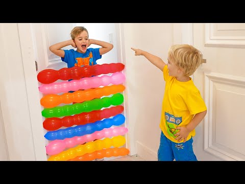 Chris and Niki play with balloons