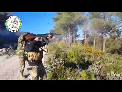 اشتباكات بين مقاتلي اللواء العاشر في الساحل وقوات النظام أثناء معارك تحرير برج زاهية في ريف اللاذقية