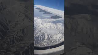 preview picture of video 'منظر الجبال من الطائره اثناء رحلتي الى مشهد ايران جدا رائع'