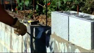 Muro contención tierras con bloques de cemento, armados y corona Capitulo II  video nº 52.wmv