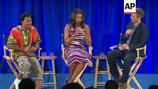 US First lady Michele Obama joined by Seth Myers and Nick Cannon at back to school event