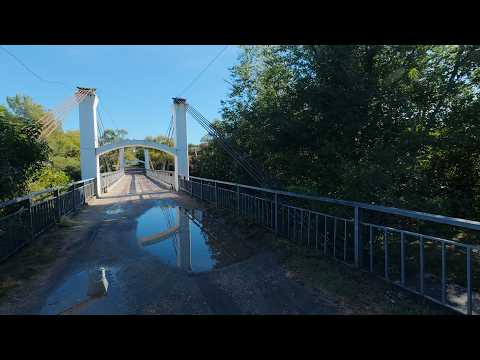 Explorando Alpa Corral: Puente Colgante y Unión de los Ríos