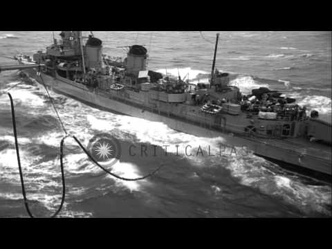 USS Heyliger (DE-510) is refueled from USS Valley Forge (CVS-45) in the Caribbean...HD Stock Footage