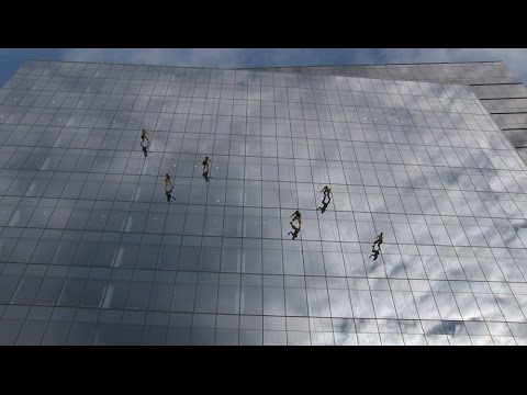Dancers perform vertical routine across Boston building facade