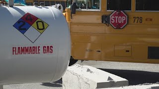 Guilford County Schools propane bus ribbon cutting