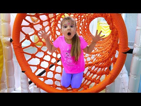 Diana and Roma have fun playing at the Indoor Playground for kids