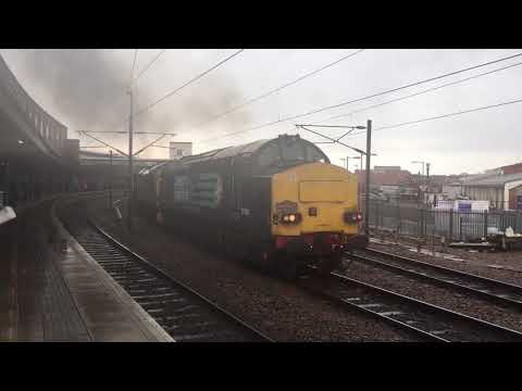 (HD) DRS class 37s nos 37605+37259 erupt out off York with Cardiff to Inverness Easter special