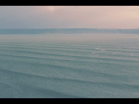 Longboarders at Saunton Sands