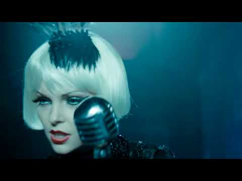 Dark Streets (2008) trailer still with nightclub stage and spotlighted chanteuse