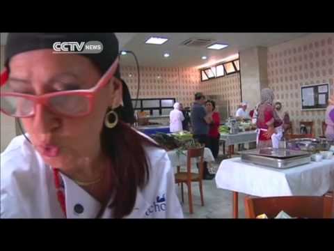 Visitors feast on varieties of North African staple dish Couscous