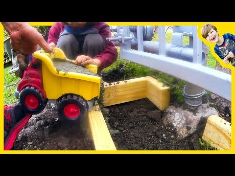 Axel Show Dump Truck Pouring Cement!
