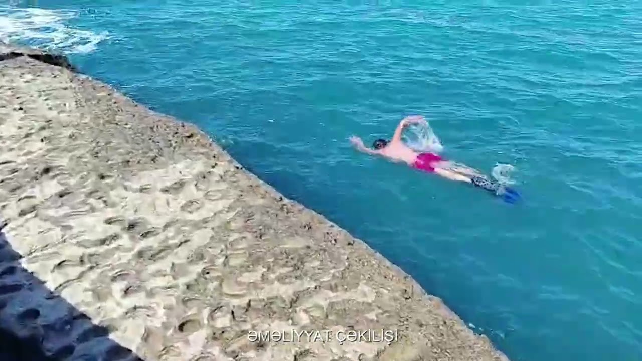 Dənizdə batan qızın axtarışlarına helikopter cəlb olunub