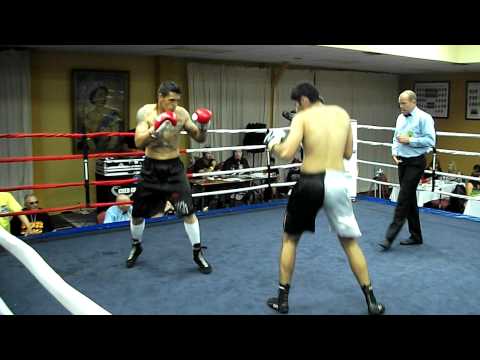 Malaysia's pro boxer Muhammad Meeraj vs Don Giles(nz) rd 1