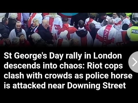 Forgotten, Scorned & Attacked. England day in London. St George's day. Riot police. Tommy Robinson
