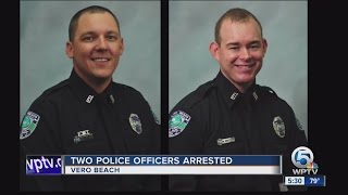Two police officers arrested