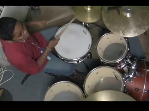 JEROME CHARLES AT 9 YEARS PLAYS AN AMAZING DRUM SOLO