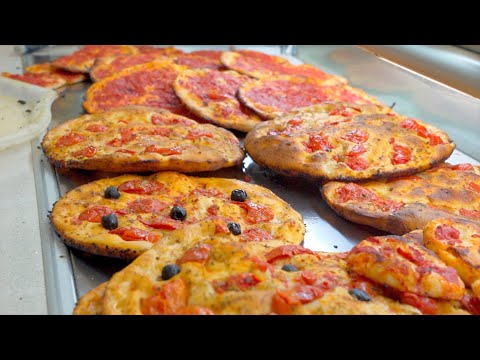 Não é pizza, não é focaccia! É Pizzella!Uma padaria italiana sempre lotada de clientes!PanificioBove