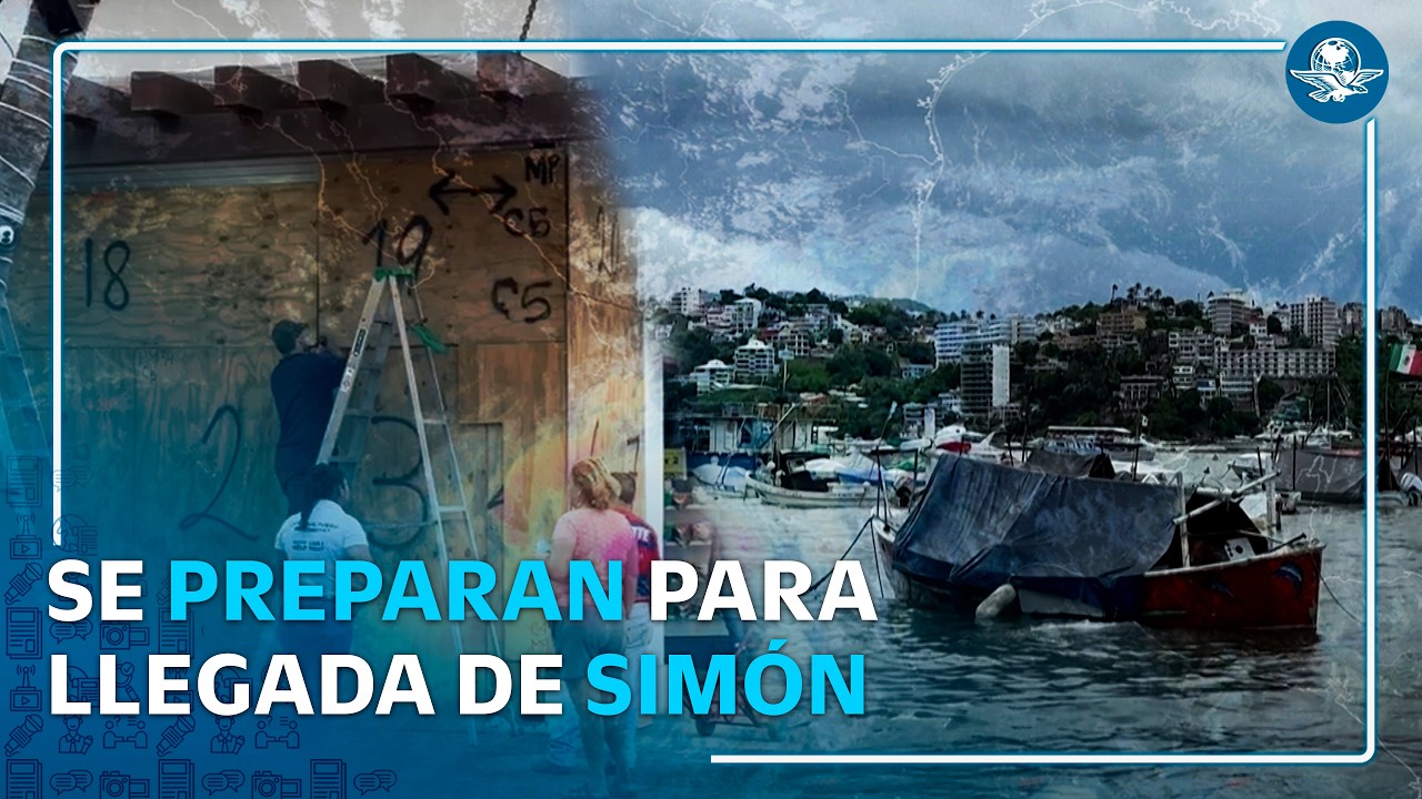 Comerciantes blindan el malecón de Vallarta ante llegada del huracán Simón