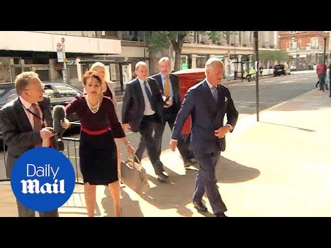 Moment Prince Charles' press secretary snatches microphone - Daily Mail