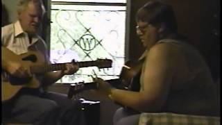 Doc Watson plays and sings Freight Train