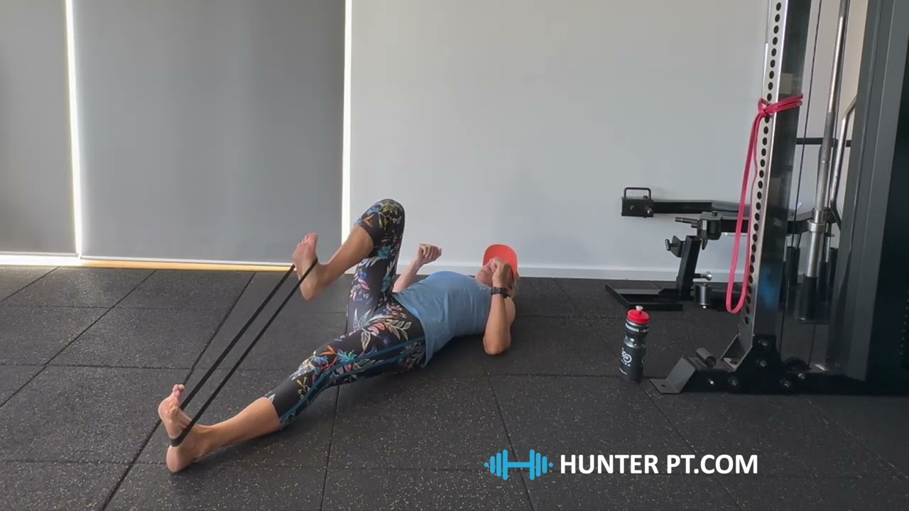 Supine hip flexor marches with mini band