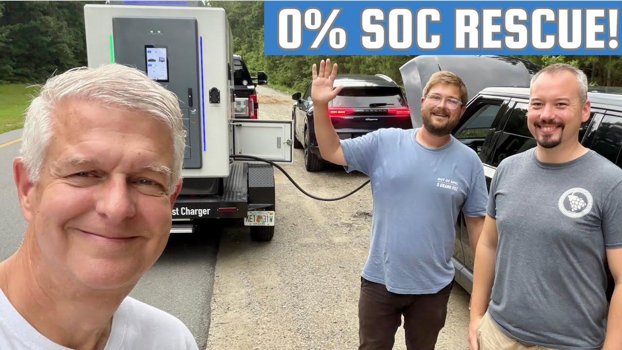 Mobile DC fast charging trailer parked beside a stranded electric vehicle