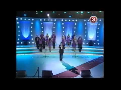 Koru Kari 2 - Andris Ērglis un  Liepājas violetais koris  - Savās mājās, savā tēvijā