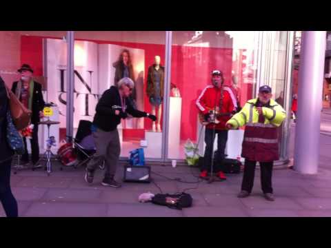 Four gents busking on Market St Manchester Feb 4th 2017