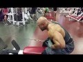 BODYBUILDER CARL MATTHEWS seated bent over rows