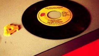 Using a vintage 45rpm record adapter
